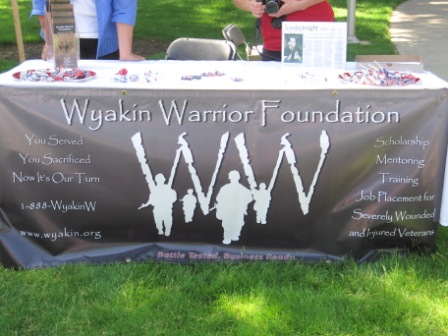 Wyakin Warrior Foundation banner on table