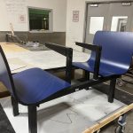 2 blue commercial-grade laminate chairs