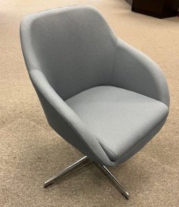 A grey Johnnie guest chair