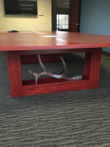 conference room table with custom metal work